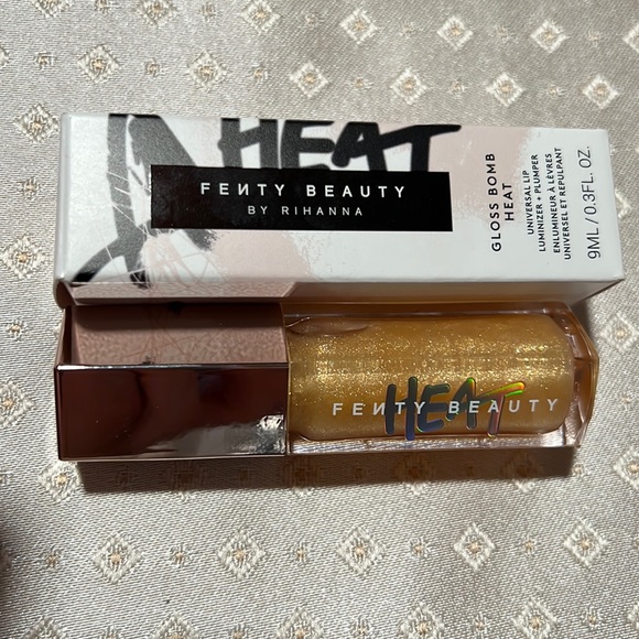 The FENTY BEAUTY by Rihanna Gloss Bomb Heat -Lemon Lava - Picture 2 of 3